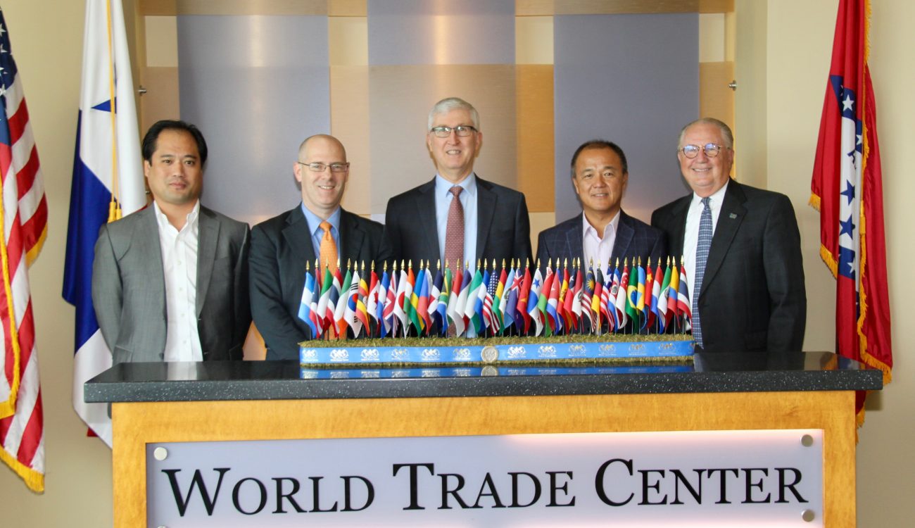 Former. Asst. U.S. Trade Representative Tim Stratford (center) stands with Ben Walters (left) and Mark Hamer (center-left) of the Arkansas Economic Development Commission's Global Business Development Team and World Trade Center Arkansas President and CEO Dan Hendrix (right) and Senior Director of Global Trade Strategy, Boon Tan (center-right).