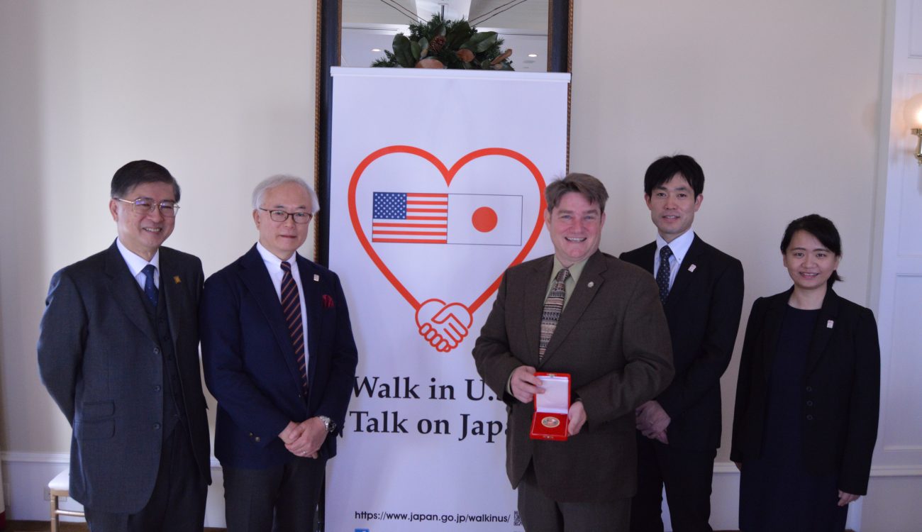 The presenting members of the Walk in U.S. Talk on Japan delegation stand with Arkansas Secretary of State, Mark Martin at the Capitol Hotel in Little Rock on Monday, Dec. 10. From left to right Dr. Kazutomo Irie, Prof. Tomohiko Taniguchi, Mark Martin, Koji Uenoyama, and Xiaojing Zhou.
